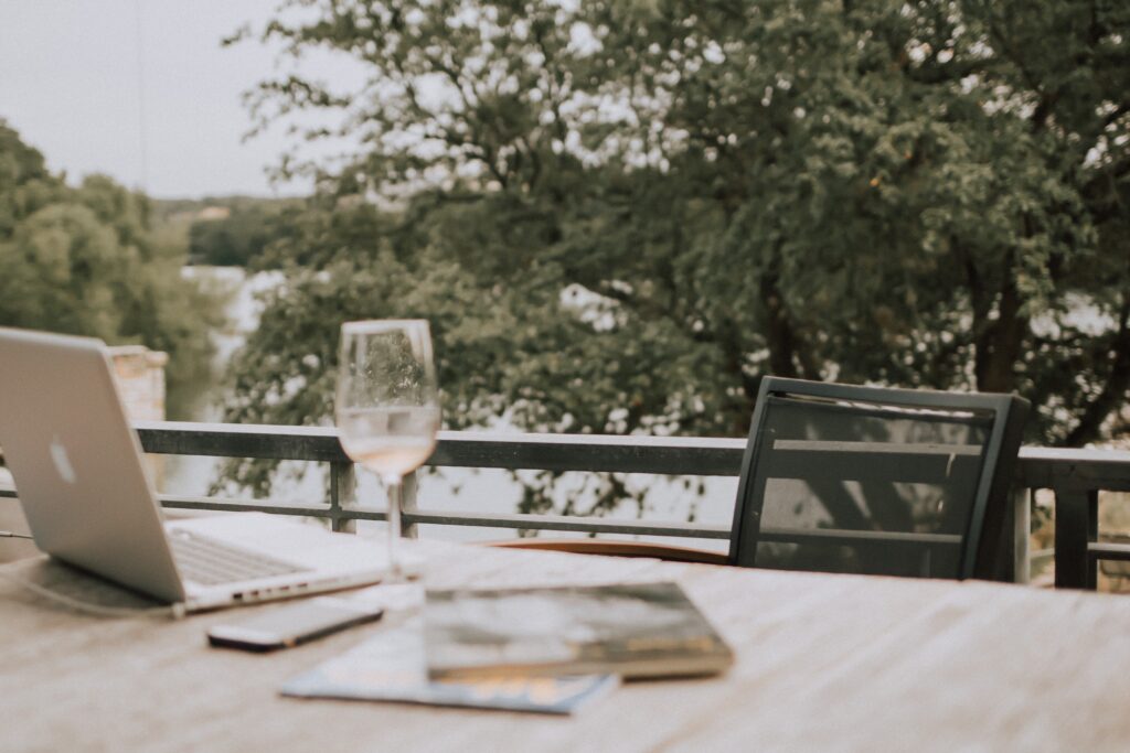 Laptop on patio table outside